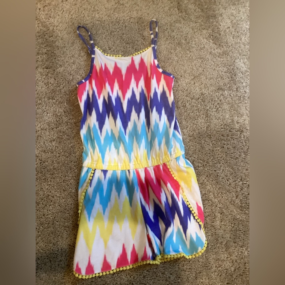 Girls size (12) romper. New without tags.